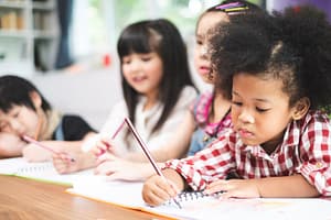 Reading and writing primary students - CurioBuddy In a world filled with screens, CurioBuddy's magazines, The KK Times and The Qurious Atom,  bridge the gap between digital devices and essential learning by promoting reading and writing.