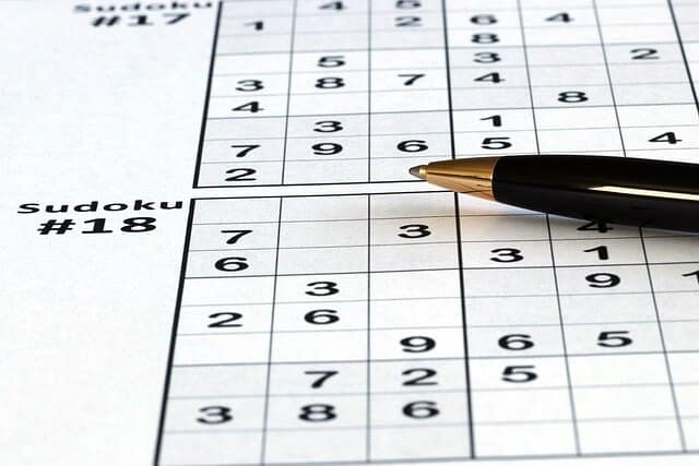 Playing Sudoku - CurioBuddy Sudoku: A popular puzzle game that's easy to learn and play. CurioBuddy Sudoku enhances logical reasoning skills.